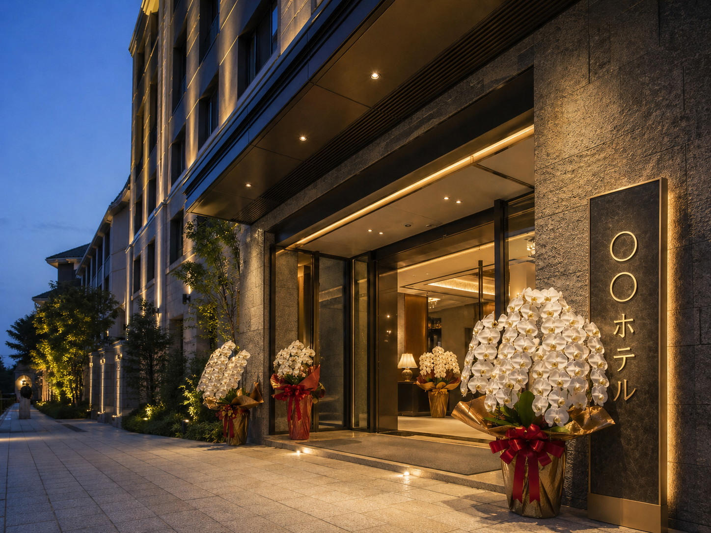 ホテルの開業祝いに贈られた白胡蝶蘭の大鉢